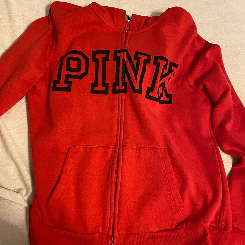 Victoria’s secret pink zip-up hoddie. Size: M